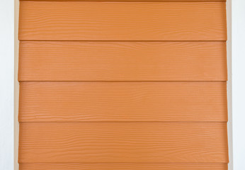 material wooden siding brown color. fiber cement board texture
