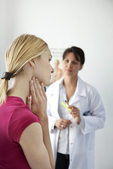 Consultation, woman in pain