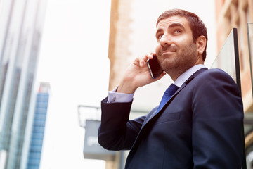 Portrait of handsome businessman outdoor