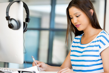 Young woman in office