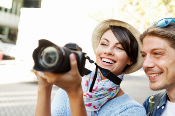 Smiling couple with the camera