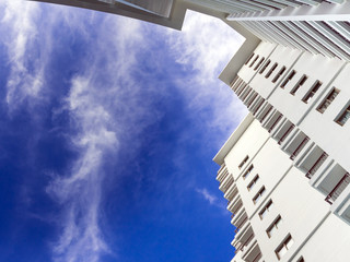 High-rise building and bright blue sky