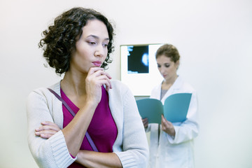 Doctor explaining to a patient the result of her mammogram