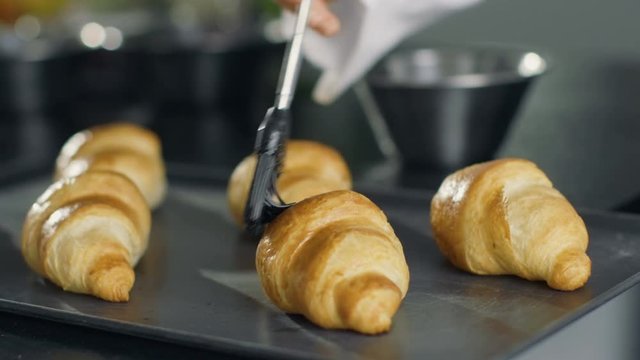 Professional French Baker Butters Croissants