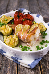 Baked fish with vegetables