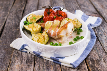 Baked fish with vegetables