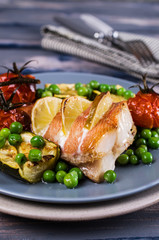 Baked fish with vegetables