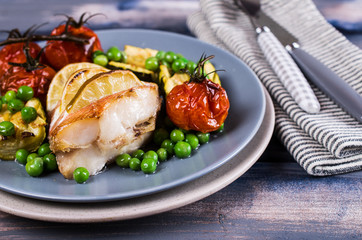 Baked fish with vegetables