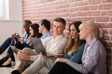 Fototapeta premium People Looking At Laptop