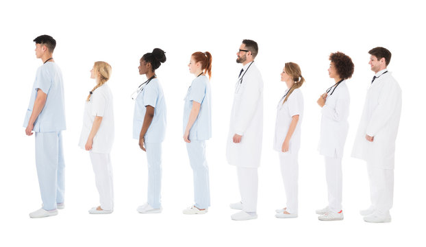 Multiracial Medical Team Standing On Row