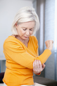 Senior Woman With Elbow Pain