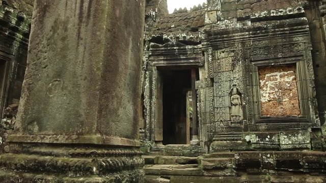 Temple sculptures and architecture, smooth tracking shot, Banteay Kdei temple in Angkor Wat area, Cambodia