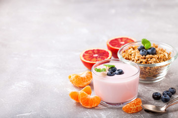 Healthy breakfast - muesli, yogurt and fruit. Selective focus. Copy space