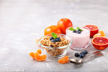 Healthy breakfast - muesli, yogurt and fruit. Selective focus. Copy space