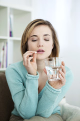 Woman taking medication