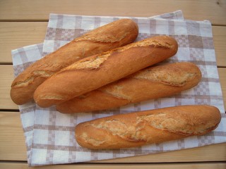 Baguettes on a rustic table........