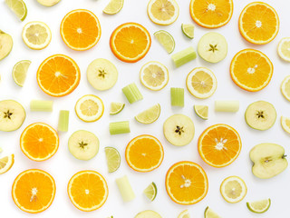 Orange slices and apples on a white background. Fruit pattern. Abstract food background. Top view.