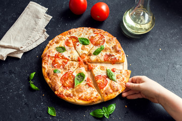 Taking Slice Of Pizza Margherita © mizina