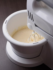 Fototapeta na wymiar Planetary mixer cooking dough