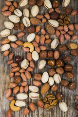 Nuts on a  wooden table.