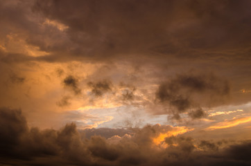 Obraz na płótnie Canvas Storm clouds in the sunset light