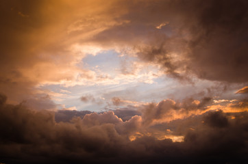 Obraz premium Storm clouds in the sunset light