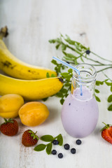 Smoothies and ripe  fruits