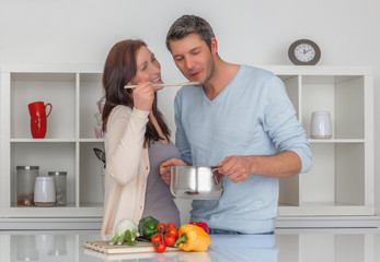 cooking together at home couple