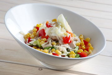 Salad with corn, egg, pepper, cheese