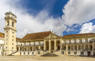 Fototapeta premium Courtyard with clock tower in complex University of Coimbra - Portugal