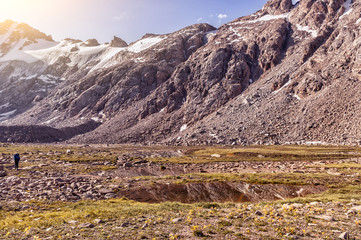 Landscape of mountains and glaciers in the sunny weather. mountain river, lake.