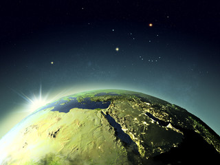 Sunset above Middle East from space