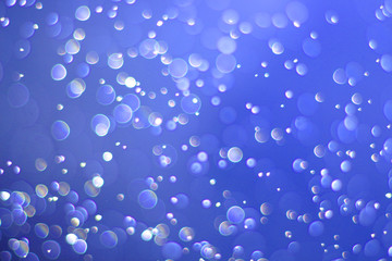 A beautiful and blurry bokeh on a blue background.