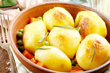 Boiled and baked potato and vegetables