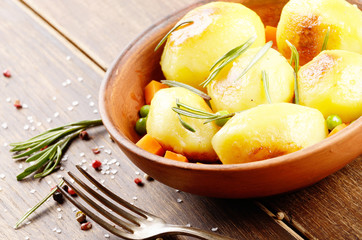 Boiled and baked potato and vegetables