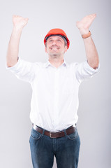 Portrait of architect posing holding something heavy