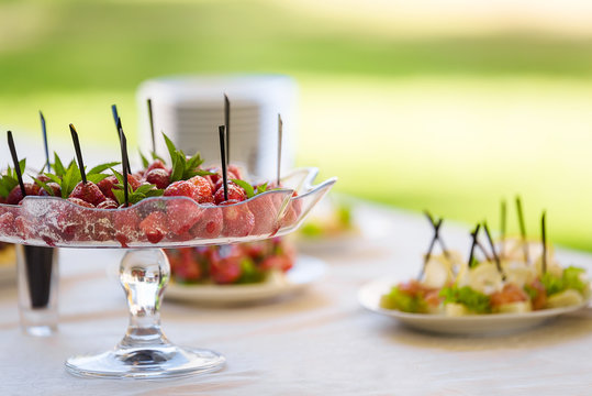 Served by canapes buffet table outdoor