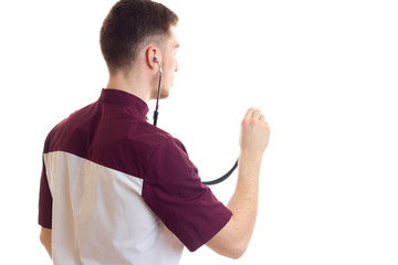 young guy in uniform with a stethoscope in your hands
