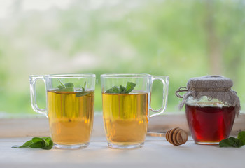 tea in glass cup on old  windowsill