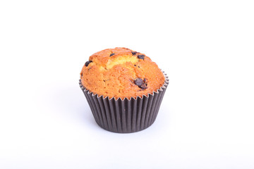 Fresh homemade muffins on white background. Top view.
