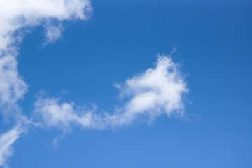 White clouds against a blue sky