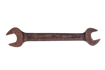 Old spanner on white background