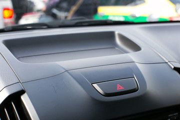 Detail of a warning button in a car