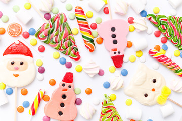 Naklejka premium lollipops, candy, top view flat lay on white background