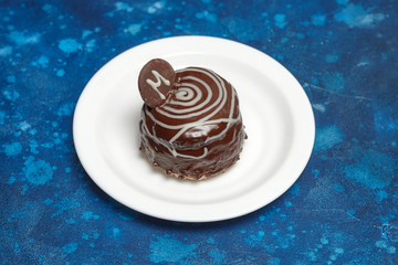 Chocolate pastry covered with glaze
