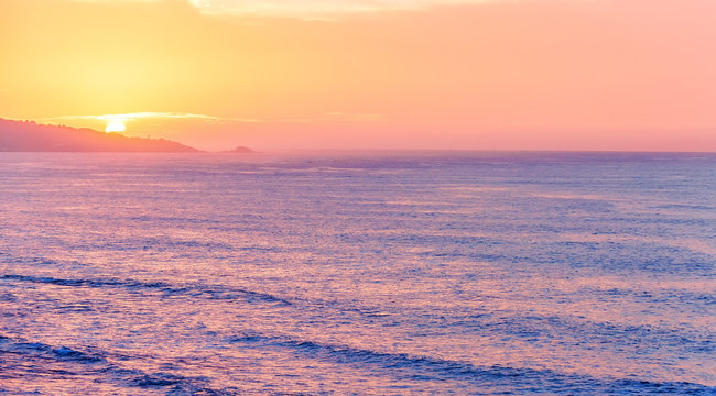 Panoramic Sea Cliff On Sunrise With Beautiful Dramatic Sky And Ocean Shore On The Background