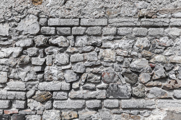 Old grungy gray stone wall texture