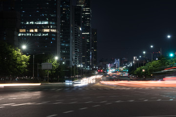 night traffic on the highway, light trace from the traffic