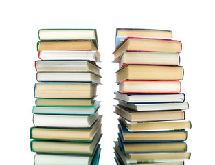 stack of books on a white background with reflection