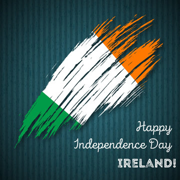 Ireland Independence Day Patriotic Design. Expressive Brush Stroke in National Flag Colors on dark striped background. Happy Independence Day Ireland Vector Greeting Card.